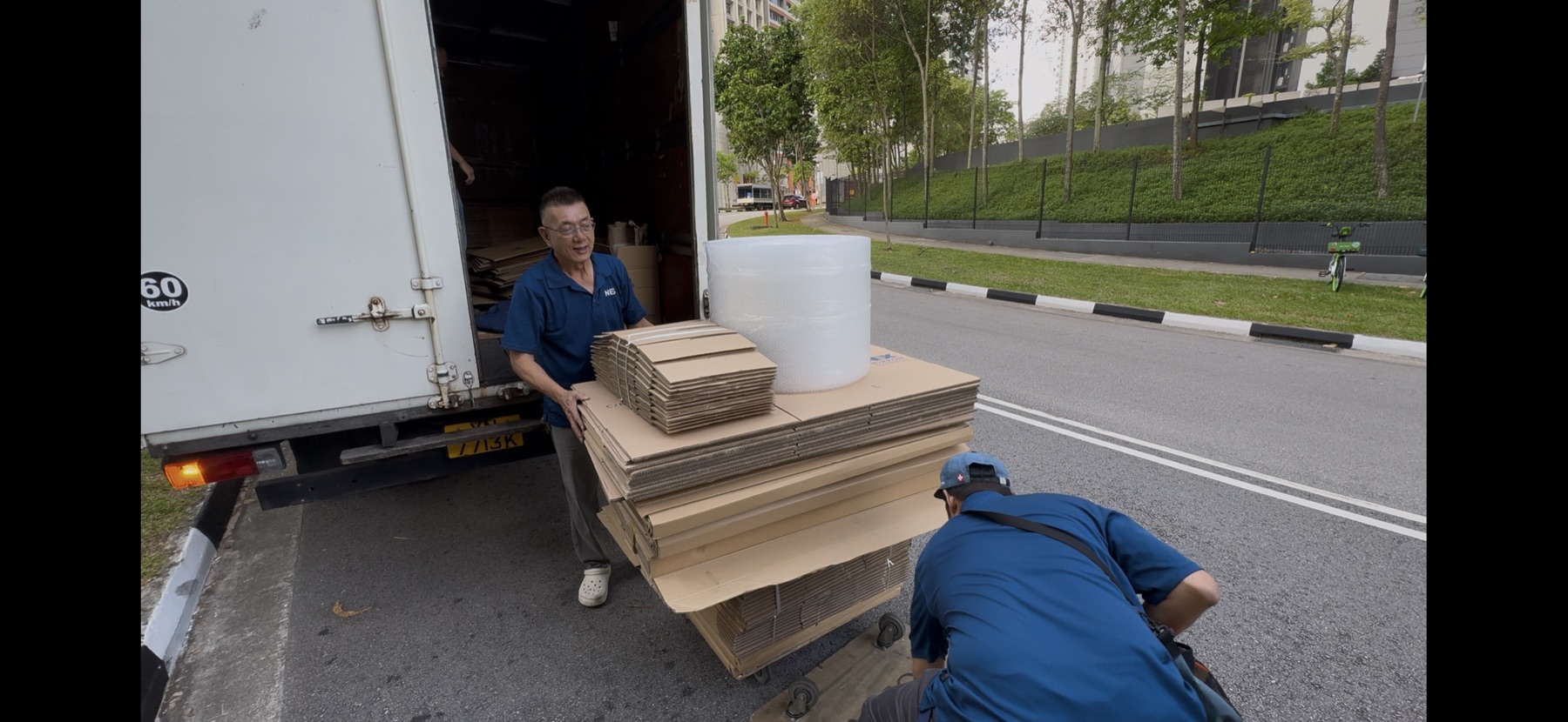 Commando Movers team loading a truck with packing materials